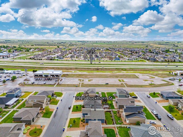 3925 Buckthorn St, Wellington, CO 80549 - aerial perspective of suburban area