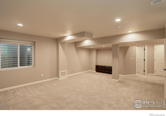 6356 Twilight Ave, Firestone, CO 80504 - finished basement with light colored carpet, recessed lighting, and baseboards