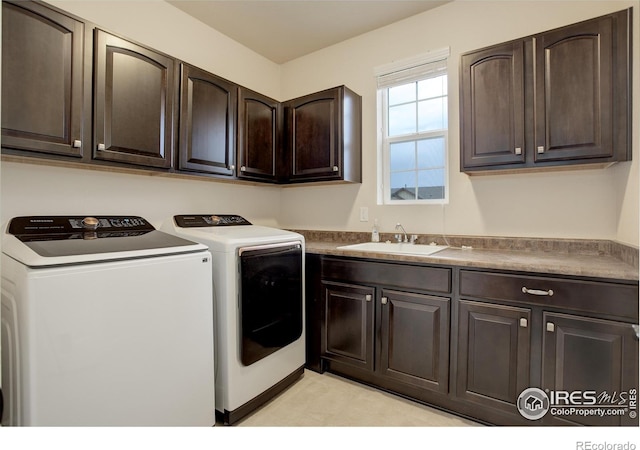 6356 Twilight Ave, Firestone, CO 80504 - laundry area featuring cabinet space and washer and dryer