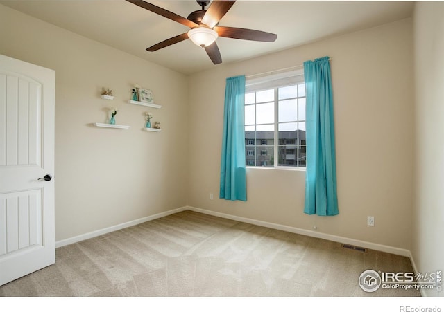 6356 Twilight Ave, Firestone, CO 80504 - empty room with a ceiling fan, carpet floors, and baseboards