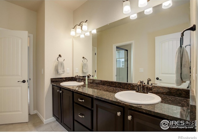 6356 Twilight Ave, Firestone, CO 80504 - full bath with double vanity and tile patterned floors