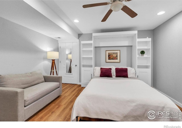 13255 Red Deer Trl, Broomfield, CO 80020 - bedroom with wood finished floors, recessed lighting, and a ceiling fan