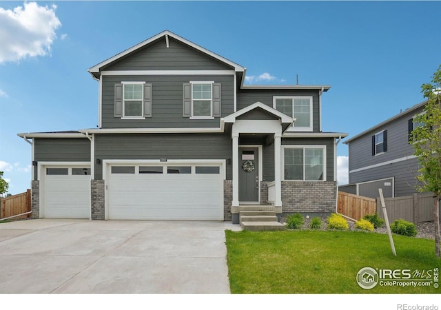 1800 Vantage Pkwy, Berthoud, CO 80513 - craftsman inspired home featuring driveway, an attached garage, and brick siding