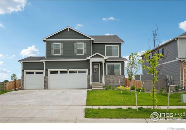 1800 Vantage Pkwy, Berthoud, CO 80513 - craftsman-style house with concrete driveway and a garage