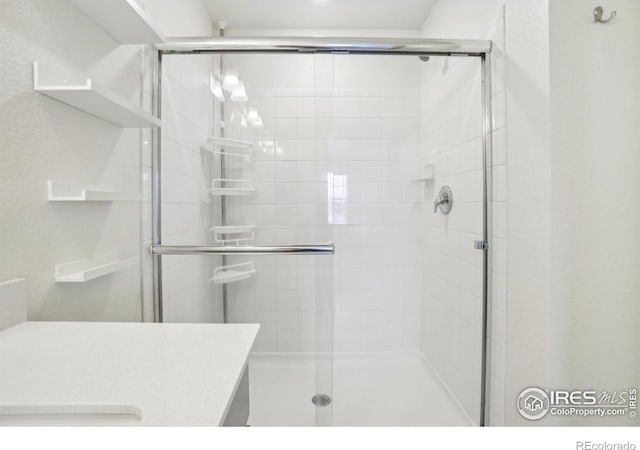1800 Vantage Pkwy, Berthoud, CO 80513 - full bathroom featuring a shower stall and vanity