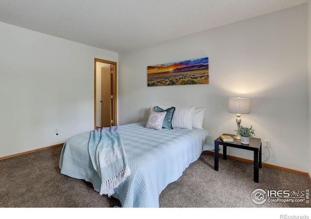 2800 Sundown Ln Unit 109, Boulder, CO 80303 - bedroom featuring carpet floors and baseboards