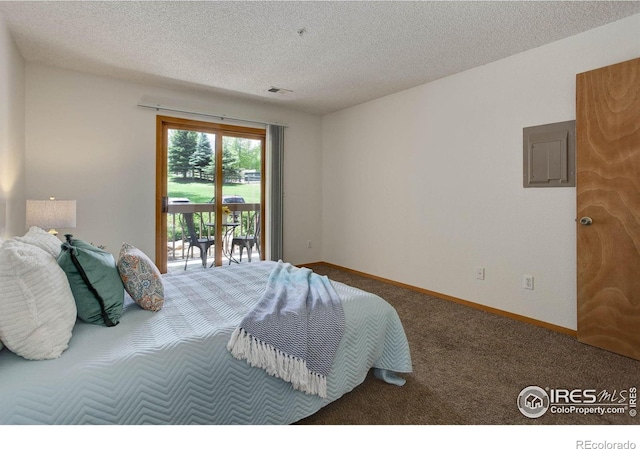 2800 Sundown Ln Unit 109, Boulder, CO 80303 - carpeted bedroom with access to outside, electric panel, a textured ceiling, and baseboards