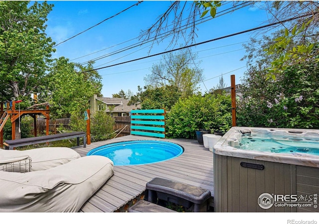 1350 Lehigh St, Boulder, CO 80305 - view of pool featuring a hot tub and a deck