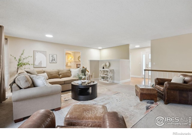1400 38th Ave, Greeley, CO 80634 - living room with recessed lighting and light carpet