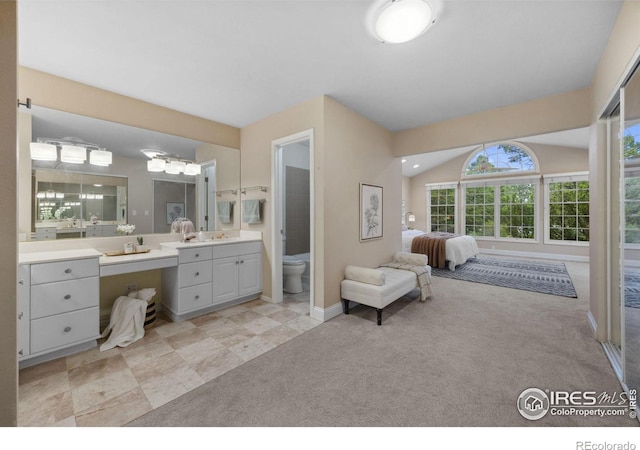 1400 38th Ave, Greeley, CO 80634 - full bath featuring toilet, vanity, and baseboards
