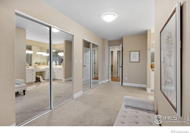 1400 38th Ave, Greeley, CO 80634 - unfurnished living room featuring light carpet and baseboards