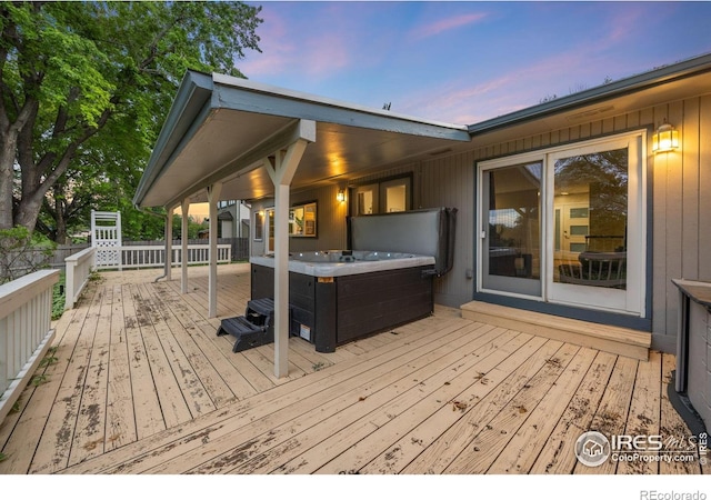 1400 38th Ave, Greeley, CO 80634 - deck at dusk with a hot tub
