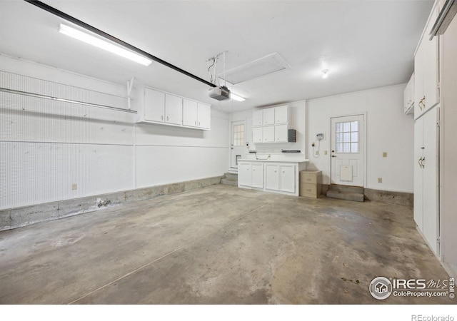 1400 38th Ave, Greeley, CO 80634 - garage featuring a garage door opener