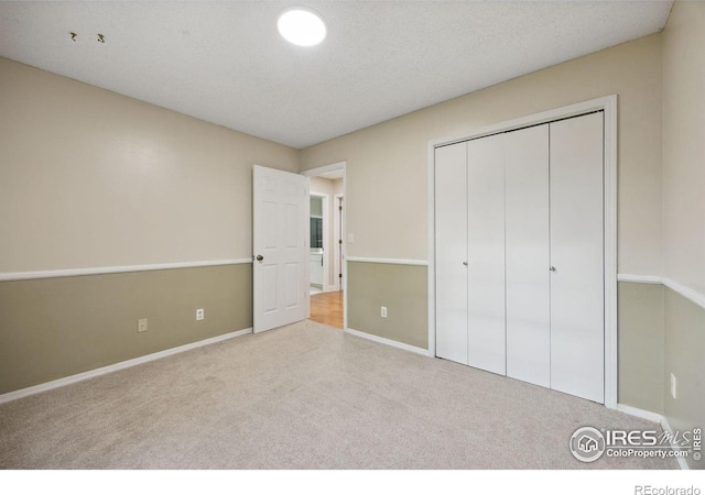 1400 38th Ave, Greeley, CO 80634 - unfurnished bedroom with carpet, baseboards, and a closet