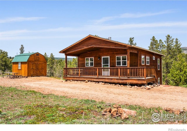 251 Huron Rd, Red Feather Lakes, CO 80545 - view of front of house featuring a wooden deck