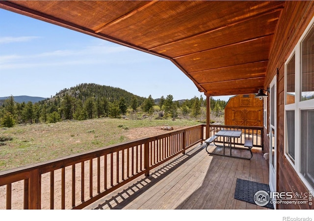 251 Huron Rd, Red Feather Lakes, CO 80545 - wooden deck featuring a forest view and a mountain view
