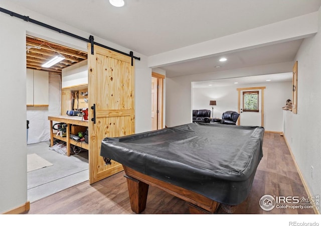 251 Huron Rd, Red Feather Lakes, CO 80545 - game room with wood finished floors, billiards, a barn door, and recessed lighting