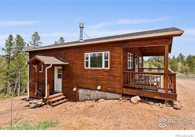 251 Huron Rd, Red Feather Lakes, CO 80545 - view of front of property with a shingled roof