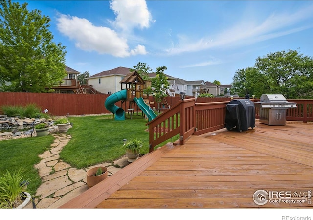 3006 54th Ave, Greeley, CO 80634 - deck with a grill, a playground, and a residential view
