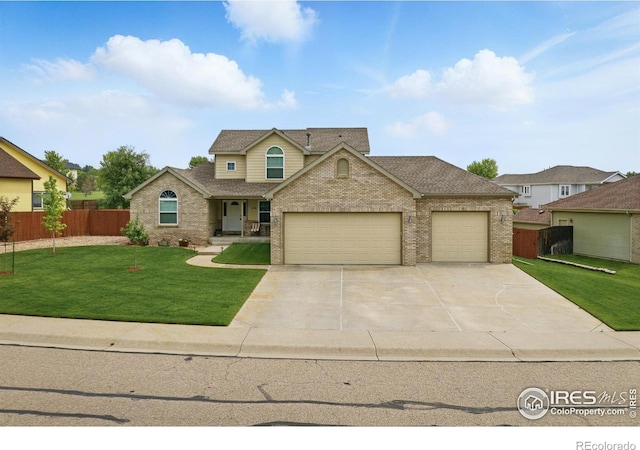 3006 54th Ave, Greeley, CO 80634 - traditional home featuring brick siding, an attached garage, driveway, and a shingled roof