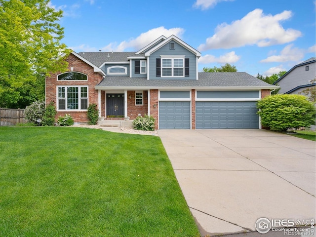 702 Dearborn St, Fort Collins, CO 80525 - traditional-style house featuring concrete driveway, brick siding, an attached garage, and roof with shingles