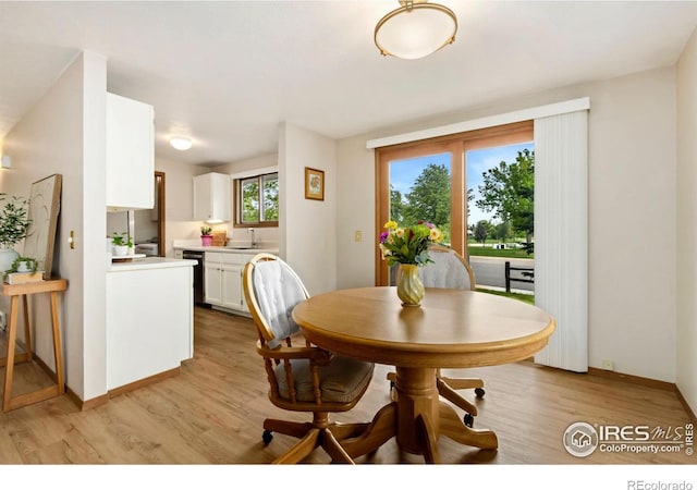 3301 Downing Ct, Fort Collins, CO 80526 - dining space with light wood-type flooring and baseboards