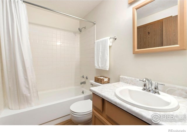 3301 Downing Ct, Fort Collins, CO 80526 - full bathroom with shower / bath combo, vanity, and toilet