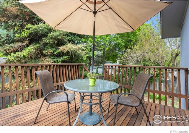 3301 Downing Ct, Fort Collins, CO 80526 - wooden deck featuring outdoor dining area