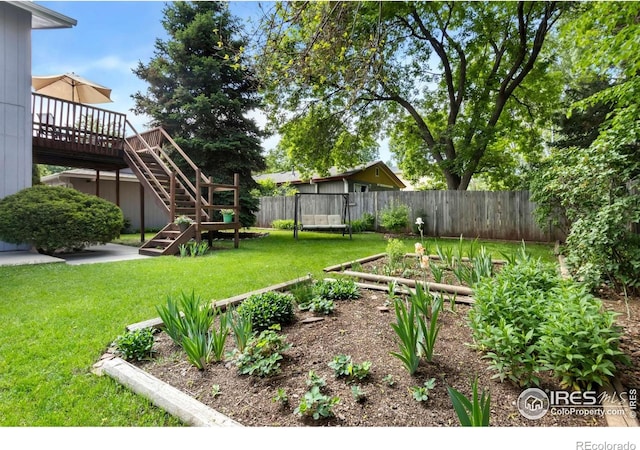 3301 Downing Ct, Fort Collins, CO 80526 - view of yard with a deck, a vegetable garden, and stairs