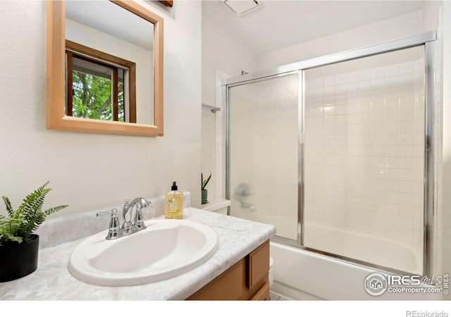 3301 Downing Ct, Fort Collins, CO 80526 - bathroom with vanity and shower / bath combination with glass door