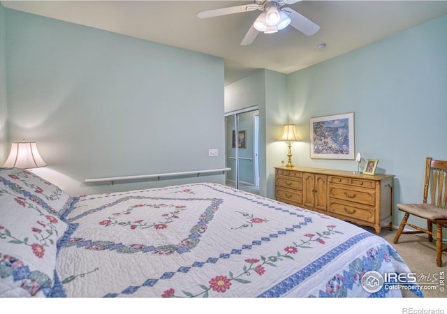10818 Cimarron St Unit 1203, Firestone, CO 80504 - bedroom featuring carpet floors, a closet, and ceiling fan