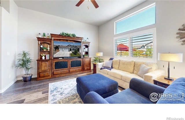 1384 Copeland Falls Rd, Severance, CO 80550 - living room with ceiling fan, wood finished floors, and baseboards