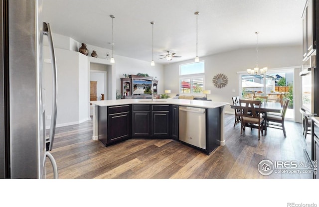 1384 Copeland Falls Rd, Severance, CO 80550 - kitchen featuring stainless steel appliances, dark wood-style flooring, a ceiling fan, and light countertops