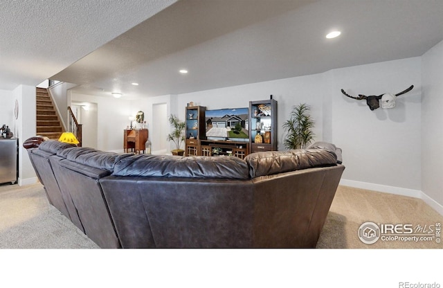 1384 Copeland Falls Rd, Severance, CO 80550 - living room with light carpet, stairs, baseboards, and recessed lighting