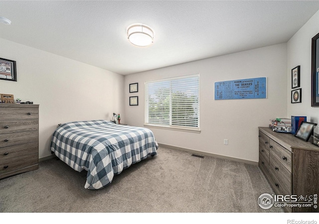 1099 Spartan Ave, Berthoud, CO 80513 - carpeted bedroom featuring baseboards