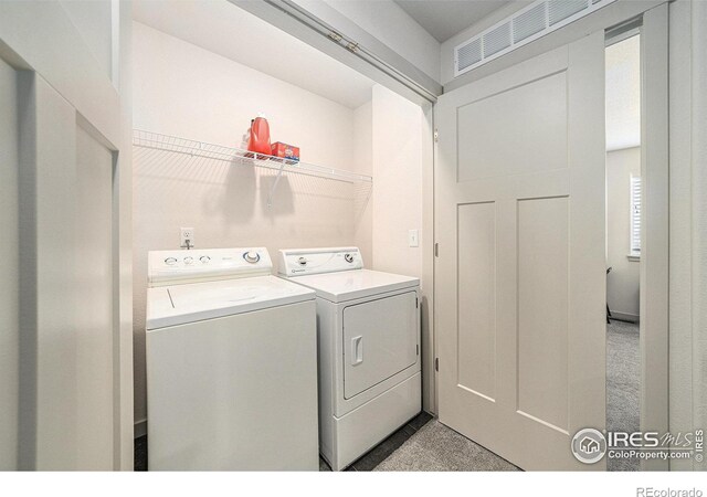 1099 Spartan Ave, Berthoud, CO 80513 - laundry area featuring separate washer and dryer and light colored carpet