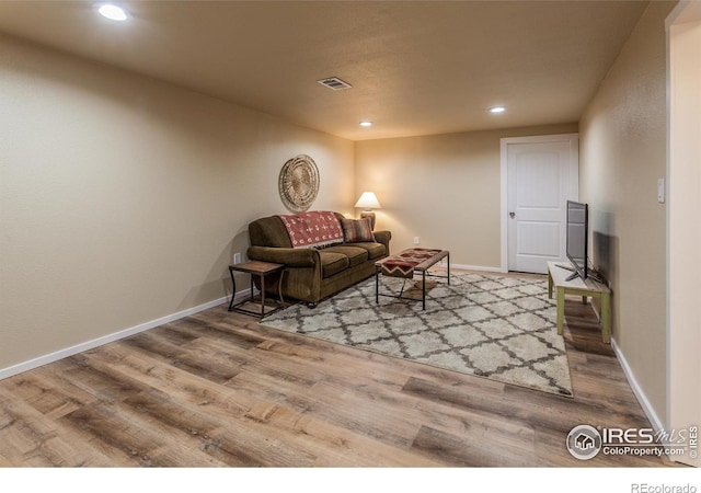 501 Copeland Way, Longmont, CO 80504 - living room with recessed lighting, wood finished floors, and baseboards