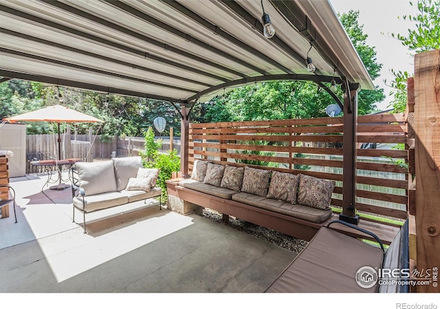 501 Copeland Way, Longmont, CO 80504 - fenced backyard with an outdoor hangout area and a patio area