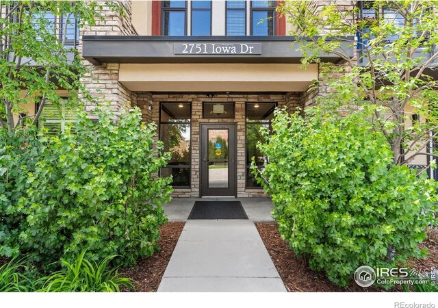 2751 Iowa Dr Unit 205, Fort Collins, CO 80525 - property entrance with stone siding