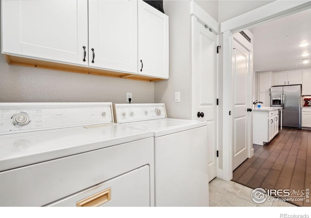 2751 Iowa Dr Unit 205, Fort Collins, CO 80525 - laundry room with cabinet space and separate washer and dryer