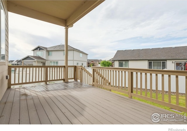 978 Mouflon Dr, Severance, CO 80550 - wooden deck featuring a residential view