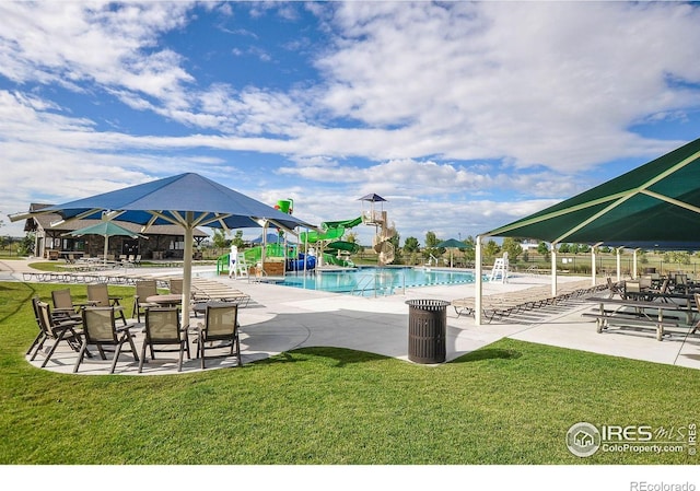 6492 Richland Ave, Timnath, CO 80547 - community pool with a yard, a patio area, and a water slide