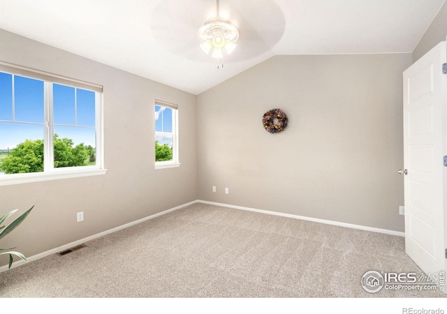 6492 Richland Ave, Timnath, CO 80547 - carpeted spare room featuring a ceiling fan, vaulted ceiling, and baseboards
