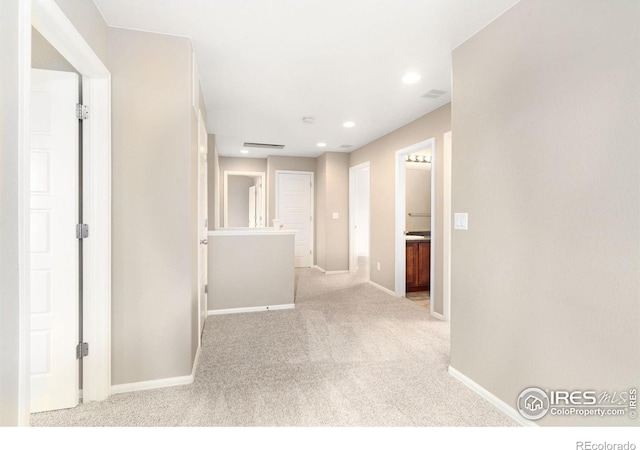 6492 Richland Ave, Timnath, CO 80547 - hallway with baseboards, carpet floors, and recessed lighting