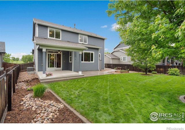 6492 Richland Ave, Timnath, CO 80547 - back of property with a patio area, central air condition unit, and ceiling fan