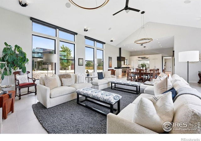 1563 Spring Creek Xing, Lafayette, CO 80026 - living area with high vaulted ceiling, ceiling fan, and light tile patterned flooring