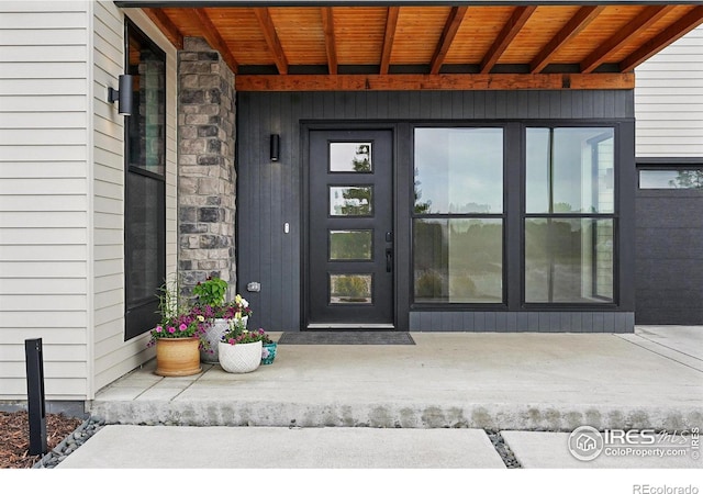 1563 Spring Creek Xing, Lafayette, CO 80026 - view of exterior entry with stone siding