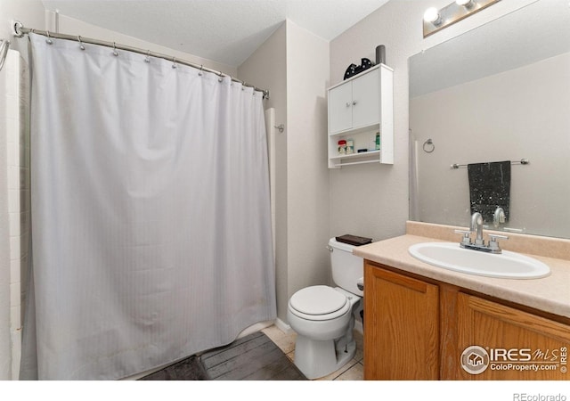 11096 Claude Ct, Northglenn, CO 80233 - full bath with toilet, vanity, and curtained shower