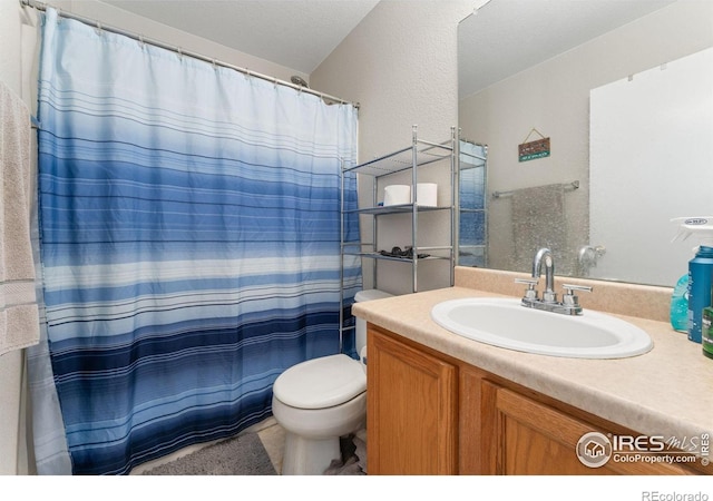 11096 Claude Ct, Northglenn, CO 80233 - full bathroom featuring toilet, vanity, and a shower with curtain