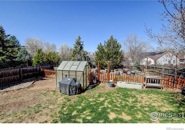 5241 E 128th Way, Thornton, CO 80241 - view of yard featuring an exterior structure and an outbuilding